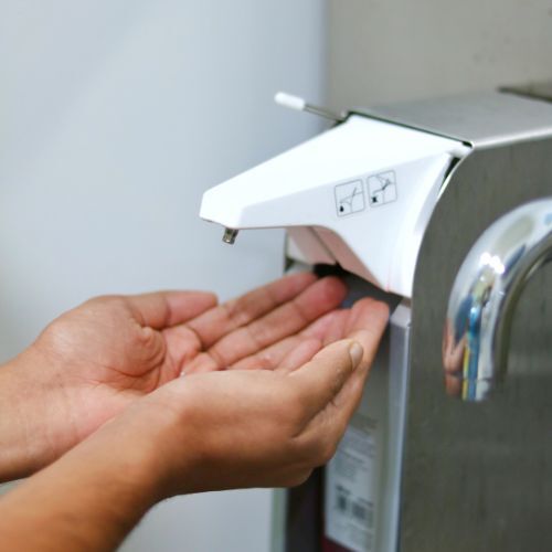 Should I Use a Wall-Mounted Dispenser or Desktop Bottle for Hand Sanitiser in NZ Offices?